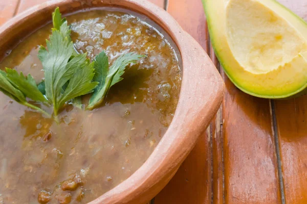lentil soup with avocado. colombian food
