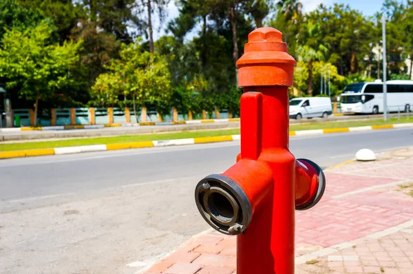 Old red fire hydrant in luxury resort city. Fire hydrant for emergency fire access