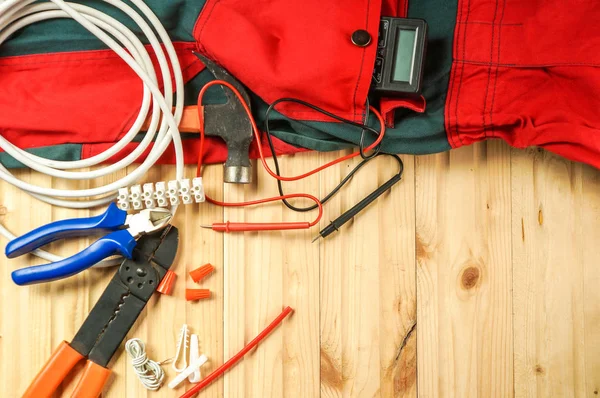 Electrical tools and working clothes — Stock Photo, Image