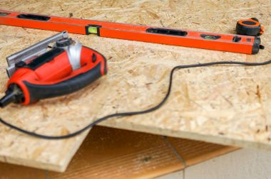 Jig gördüm düzeyi, Bina metre ile marangoz ahşap arka plan