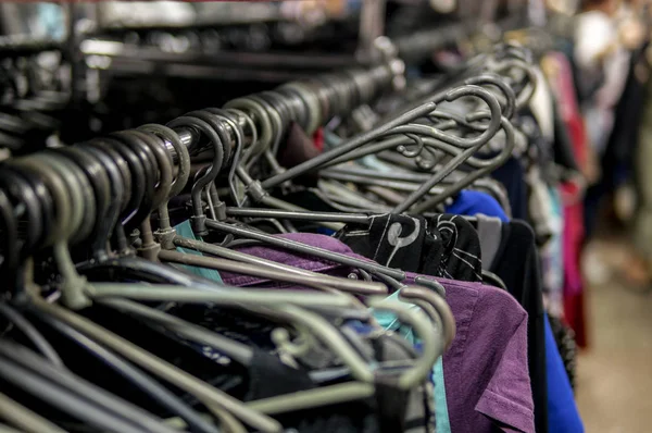 Clothes on a clothes rack — Stock Photo, Image