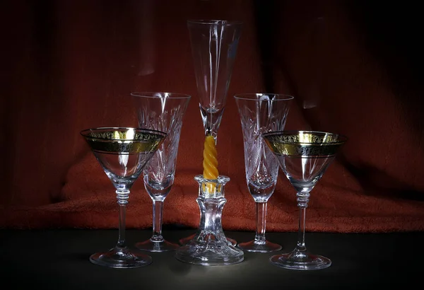 Interior items for still life: clock, fruit, wine glasses, tea set, jug, candle, computer, bottle and easel