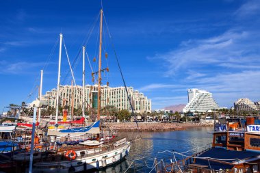 Eilat, Israel - January 4, 2017: Eilat's coastline and seaside boardwalk, known for it's Marina, shops, luxury hotels and restaurants.