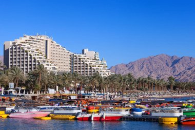 Tourists at Eilat's seaside boardwalk, known for it's shops and luxury hotels and restaurants. 