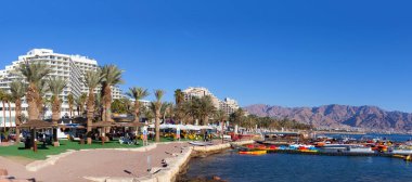 Tourists at Eilat's seaside boardwalk, known for it's shops and luxury hotels and restaurants. 