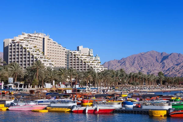 Tourists at Eilat's seaside boardwalk, known for it's shops and luxury hotels and restaurants. 