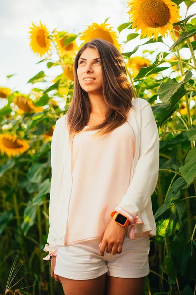 Beautiful Pensive Young Woman Standing Sunflower Field — Stockfoto