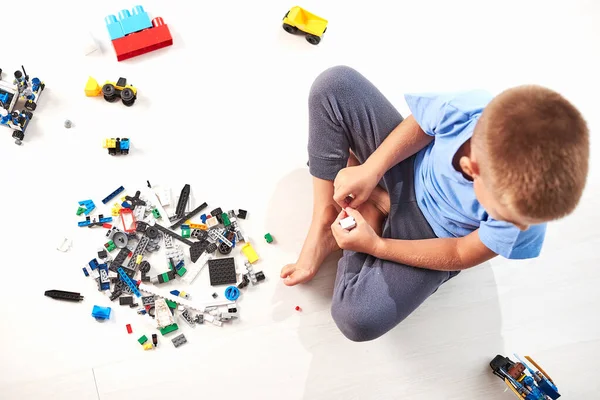 Overhead View Cute Little Boy Playing Construction Plastic Toy Blocks — Stock Photo, Image