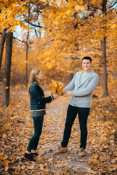 Beautiful Happy Young Couple Holding Orange Leaves Autumn Park — Stock Photo, Image