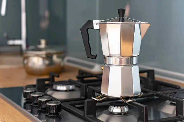 close-up view of coffee maker on stove in kitchen