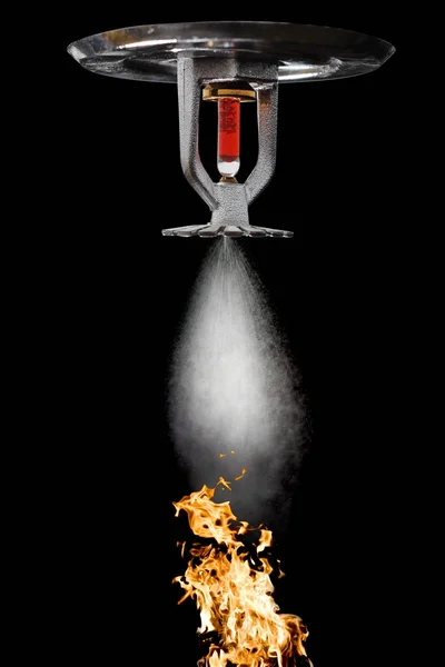 close-up view of modern fire alarm hanging on ceiling