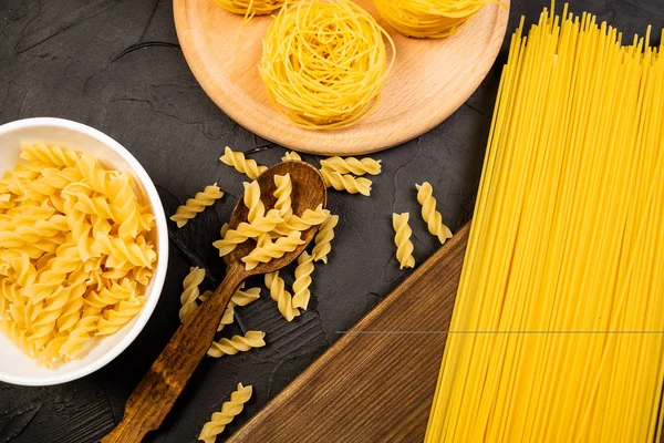 Close View Delicious Uncooked Italian Pasta Black Background — Stok Foto