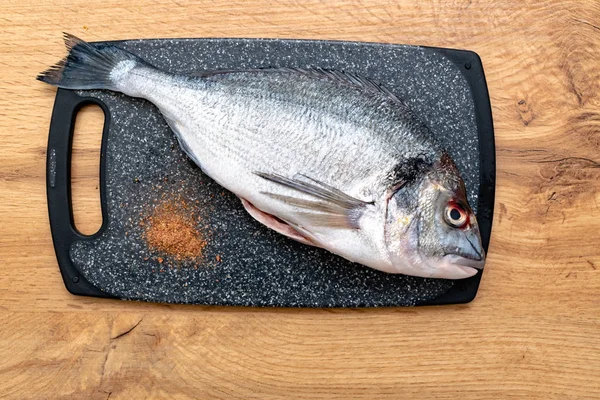 Close View Fresh Fish Spices Chopping Board Wood Table — Stok Foto