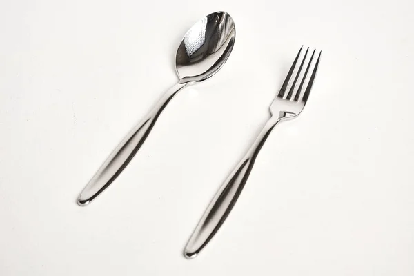 Close View Shiny Silver Fork Spoon White Background Royalty Free Stock Images