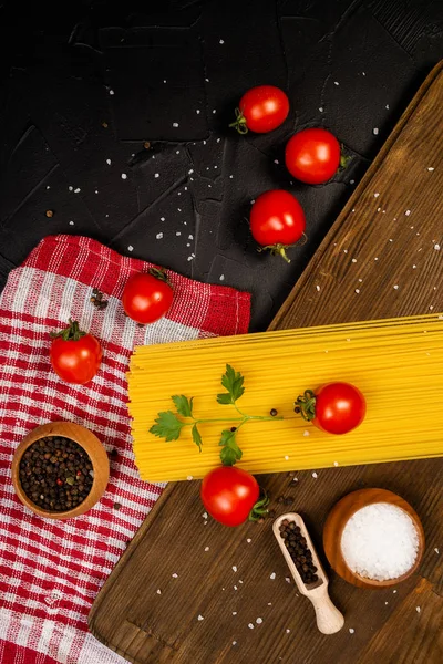 Top View Delicious Uncooked Pasta Ingredients Black Surface — Stock Photo, Image