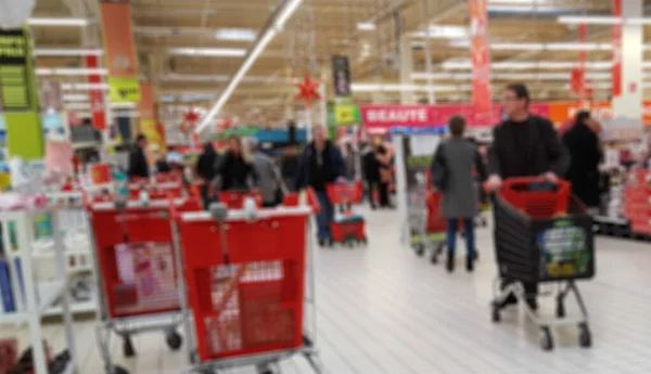 Defocus Bokeh Offuscata Persone Fare Shopping Sabato Supermercato Con Loro — Foto Stock