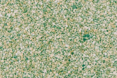 Soyut arkaplanda çakıl taşlarının çeşitli şekilleri ve renkleri