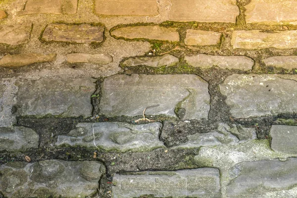 Pavimento Paralelepípedos Velho Com Formas Irregulares Uma Rua Velha Contexto — Fotografia de Stock