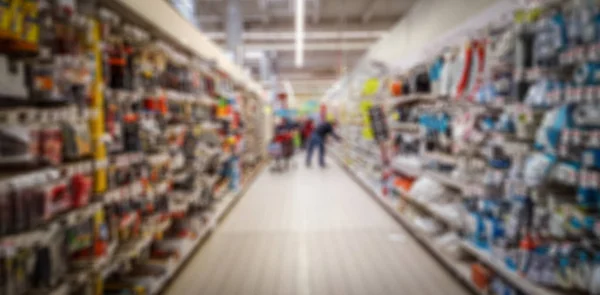 Абстрактний розмитий фон: люди купують в супермаркетах. Автобусні — стокове фото