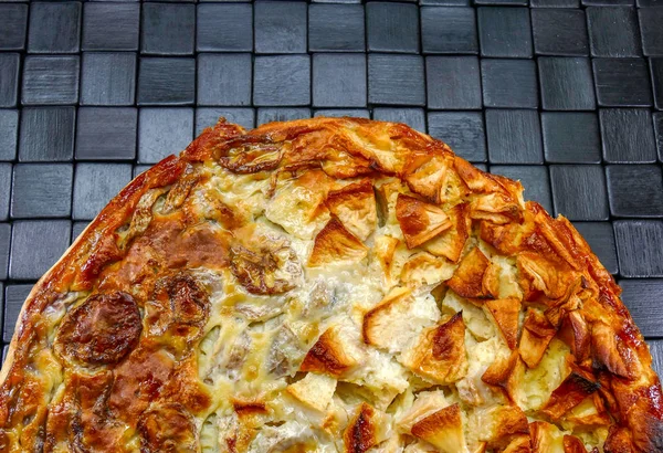 FOUGASSE : is very popular in south of France, provence region. It's a thicker pizza like bread, topped with olive, mixed herbs