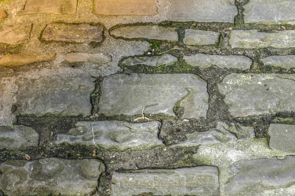 Pavimento Paralelepípedos Velho Com Formas Irregulares Uma Rua Velha Contexto — Fotografia de Stock