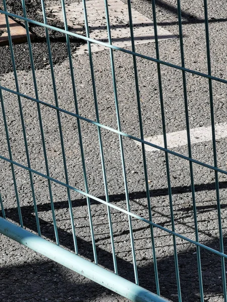 Closeup view of protective and safety construction site barrier on the street — Stock Photo, Image