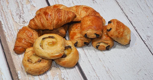 Traditional French Butter Croissant Raisin Swirl Chocolatine Wooden Background — 图库照片