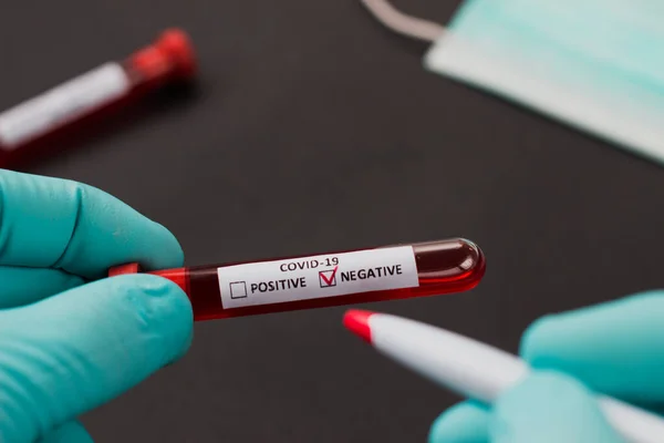 test tube of a hospital with blood to examine the virus crown in China