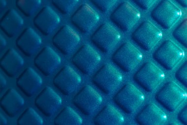 Mavi eşkenar dörtgenler: tekrarlanan elementler.