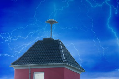 Flashes over a small tower with Air Raid Siren          clipart