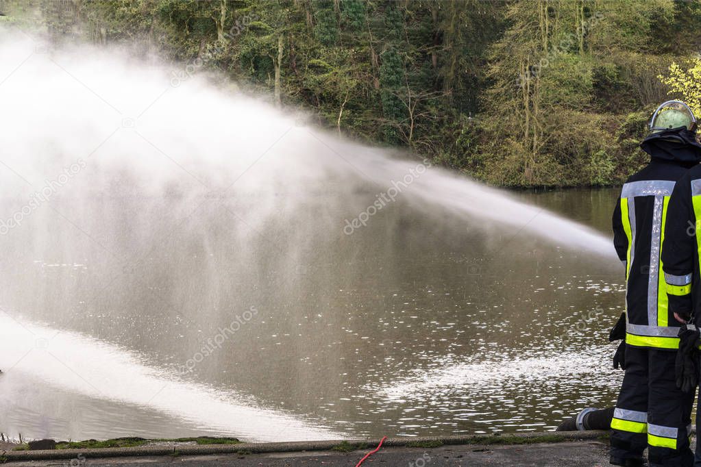 Fire department sprayed extinguishing water during an exercise. 