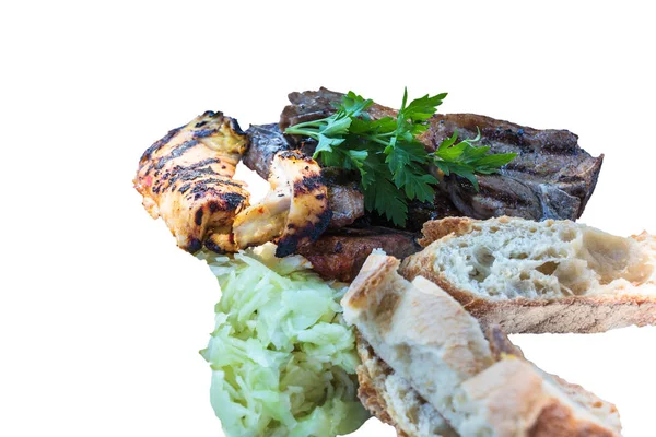 Fresh grilled meats variety meats with bread and coleslaw. — Stock Photo, Image