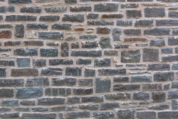 Wall structure of an old stone wall — Stock Photo, Image