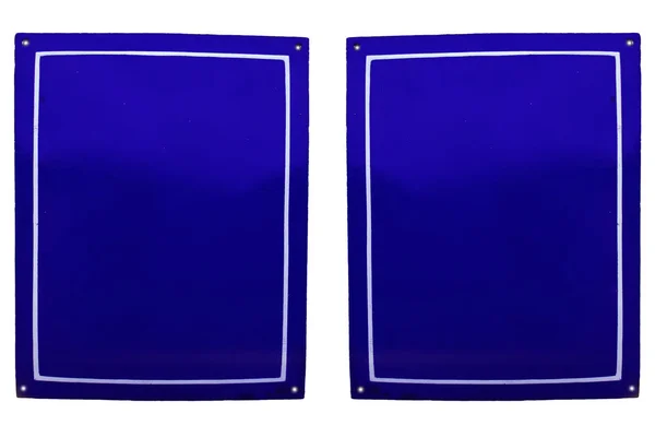Дві старі блакитні емальовані металеві пластини — стокове фото