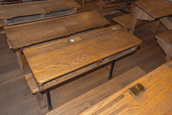 Old classroom with school desks — Stock Photo, Image