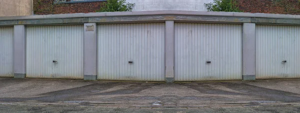 Car garage with light metal doors — Stock Photo, Image