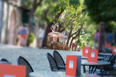 Street scene of Valldemossa with restaurant, cafes and shops.    clipart