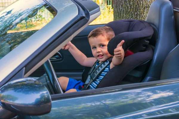 Child in a car child seat — Stock Photo, Image