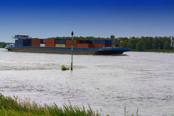 Контейнерный корабль на Рейне — стоковое фото