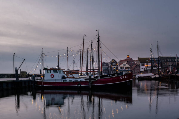 Urk Nehterlands December 2019, cloudy evening at the harbor of Urk Flevoland