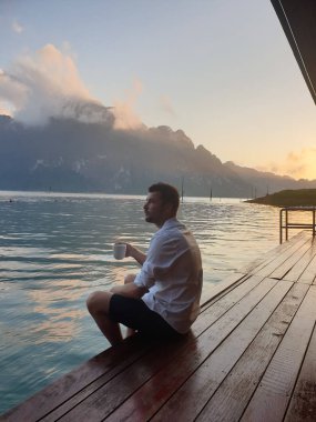 young men on vacation in Thailand visit the Khao Sok national park lake