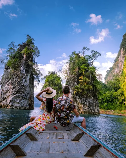 Khao Sok Thailand, couple on vacation in Thailand, men and woman in longtail boat at the Khao Sok national park Thailand — 스톡 사진