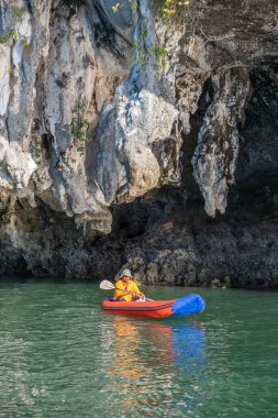 Phangnga Thailand January 2020, Phangnga Bay ocean with green Island on a beautiful day with blue sky, longtail boat sail on ocean in Thailand