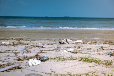 Chumphon Thailand, beach with lots of plastic bottle and stuff, Spilled garbage on the beach