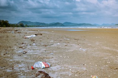 Chumphon Thailand, beach with lots of plastic bottle and stuff, Spilled garbage on the beach