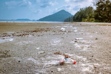 Chumphon Thailand, beach with lots of plastic bottle and stuff, Spilled garbage on the beach