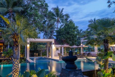 Thai style house with pool Thailand during sunset