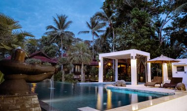 Thai style house with pool Thailand during sunset