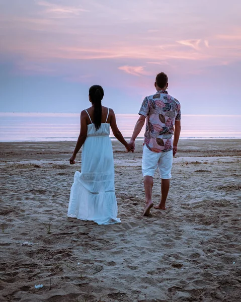 Chumphon Thailand, couple watching sunset on the beach in Thailand — ストック写真