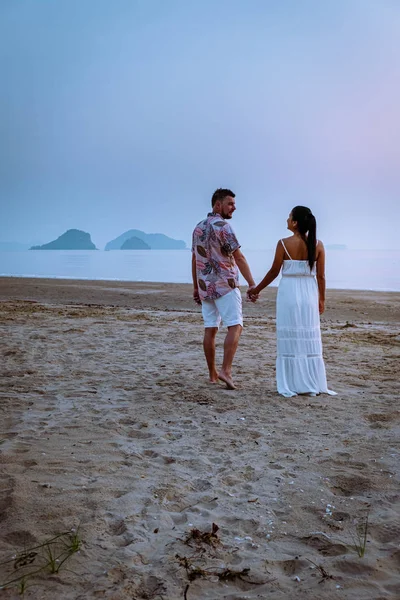 Chumphon Thailand, couple watching sunset on the beach in Thailand — Stock Photo, Image